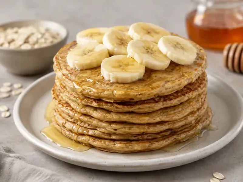 Pancakes de plátano y avena con miel
